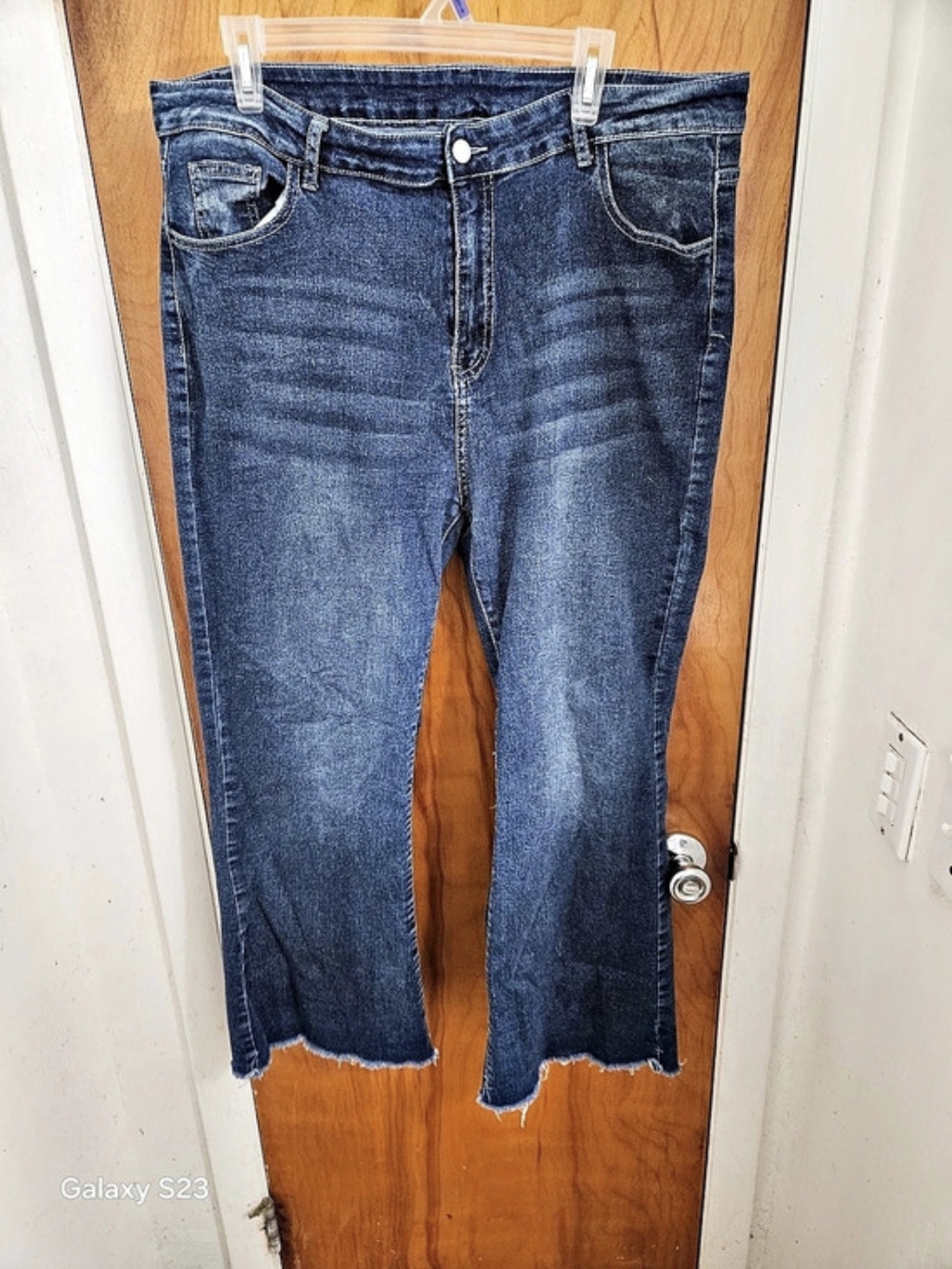 Frayed Hem Flare Jeans in Blue